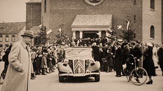 J H Biermans' Citroën in front of Herkenbosch church inaugurated in 1949, The Netherlands